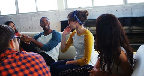 Diverse Young Adults in Lively Group Conversation Activity - Download Free Stock Images Pikwizard.com