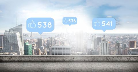 Social media likes over futuristic cityscape