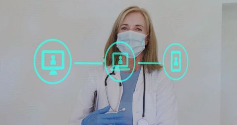 Doctor in mask embracing telemedicine technology in clinic