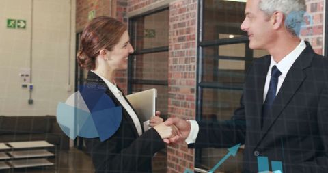 Business Professionals Shaking Hands in Modern Office Setting - Download Free Stock Images Pikwizard.com