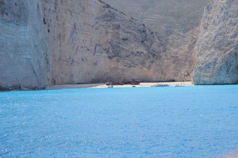 Serene Shipwreck Cove with Crystal Clear Blue Water