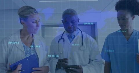Medical Team Analyzing Digital Data in Hospital for Improved Patient Care
