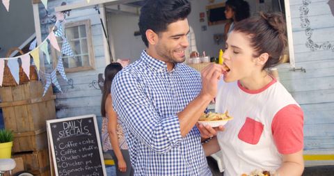Young Couple Dining Al Fresco.Vibrant,Casual Scene - Download Free Stock Images Pikwizard.com
