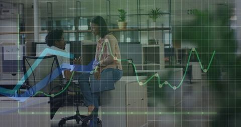 Business Colleagues Analyzing Rising Financial Data in Modern Office