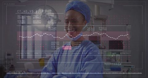 Smiling Surgeon Analyzing Data in High-Tech Operating Room