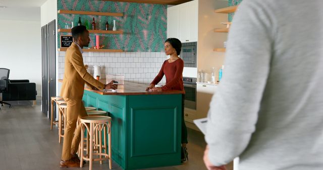 Multiracial Professionals Discussing Business in Modern Office Kitchen - Download Free Stock Images Pikwizard.com