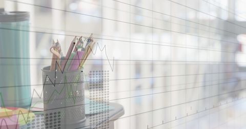 Abstract Business Growth Charts with Office Supplies