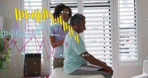 Caregiver providing shoulder therapy to senior man in bright home with digital data overlay