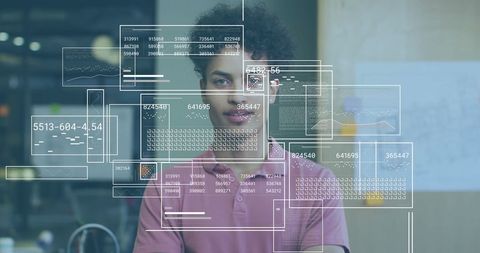 Young Professional Analyzing Digital Financial Data in Modern Workspace