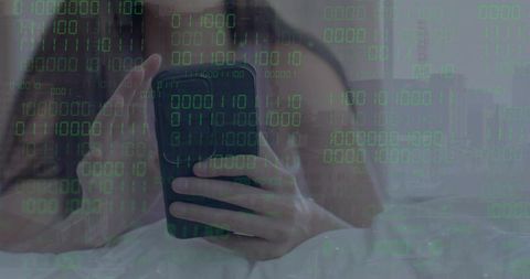 Woman holding smartphone in bed scrolling under green binary code cybersecurity overlay