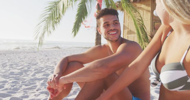 Young Couple Enjoying a Sunny Day at Tropical Beach - Download Free Stock Images Pikwizard.com