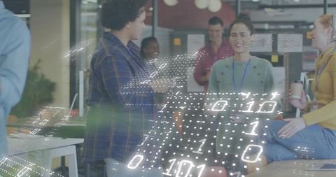 Team collaborating in modern office with binary code overlay for data-driven brainstorming