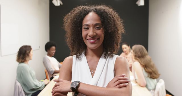 Confident Businesswoman Leading Diverse Team in Meeting Room - Download Free Stock Images Pikwizard.com