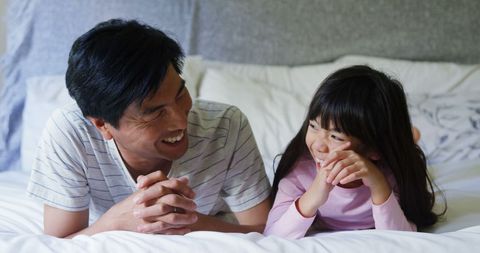 Asian Father and Daughter Enjoying Quality Time Together