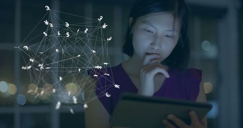Businesswoman Analyzing Global Finance with Digital Tablet - Download Free Stock Images Pikwizard.com