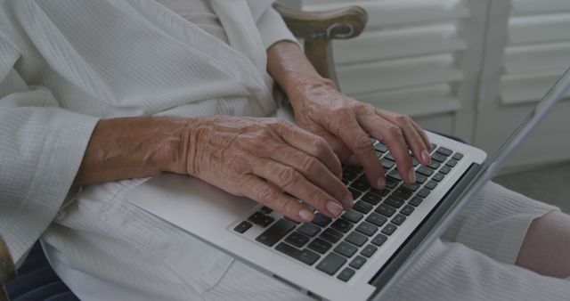 Senior Woman Engaging with Technology on Laptop - Download Free Stock Images Pikwizard.com