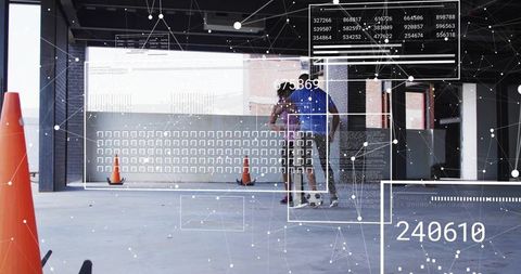 Skateboard coach assisting beginner in indoor garage training with futuristic hud overlay