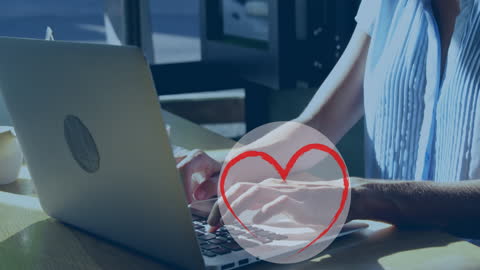 Businesswoman Typing on Laptop with Heart Animation