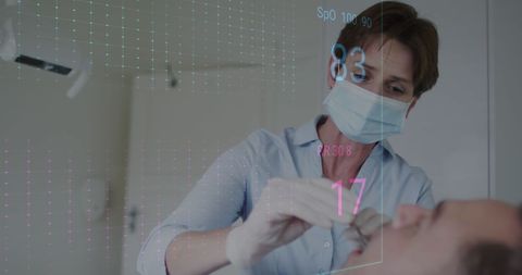 Female Dentist Using Heart Rate Monitor Examining Patient's Teeth
