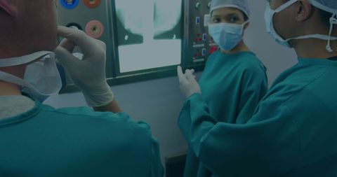 Medical Team Analyzing X-Ray in Advanced Healthcare Facility - Download Free Stock Images Pikwizard.com