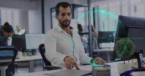 Businessman Analyzing Data with Futuristic Technology Overlay