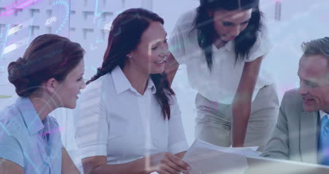 Diverse Business Team Analyzing Virtual Data at Office Meeting