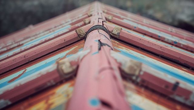 Weathered Metal Roof Ridge with Rustic Texture