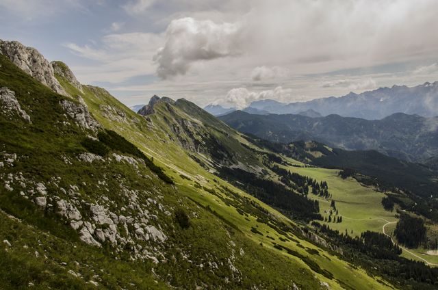 Elegant Mountain Range with Lush Greenery and Majestic Sky - Download Free Stock Photos Pikwizard.com