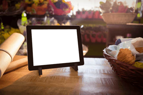 digital tablet on table with transparent screen in flower shop - Download Free Stock Videos Pikwizard.com