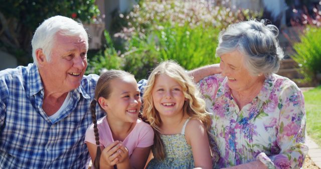 Happy Grandparents with Grandchildren outdoors on a Sunny Day - Download Free Stock Images Pikwizard.com