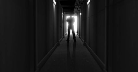 Mysterious Silhouette Man in Dark Hallway - Download Free Stock Images Pikwizard.com