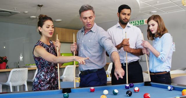 Group of Colleagues Enjoying a Pool Game During Office Break - Download Free Stock Images Pikwizard.com