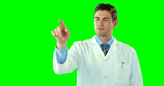 Male Doctor Pointing On Green Screen Background In White Lab Coat - Download Free Stock Images Pikwizard.com