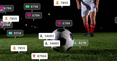 Footballer on Pitch at Night with Social Media Notifications