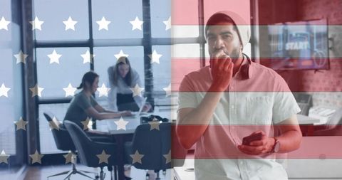 American Flag Overlay on Diverse Business Team in Modern Office