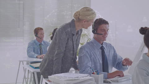 Business Team Using Headsets in Contemporary Office