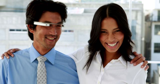 Smiling Business Colleagues in Office with Wearable Technology - Download Free Stock Images Pikwizard.com