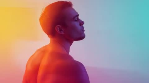 Artistic Portrait of Motivating Male Model with Dynamic Lighting