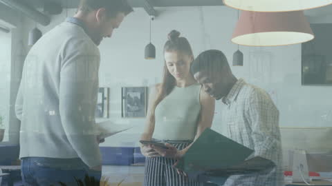 Diverse Team Collaborating on Technology Solutions in Modern Office