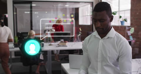 African American Businessman in Digital Office Interacting with Social Media Concepts