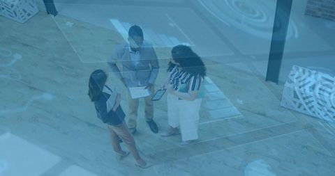 Business Team Collaboration with Technology in Modern Office