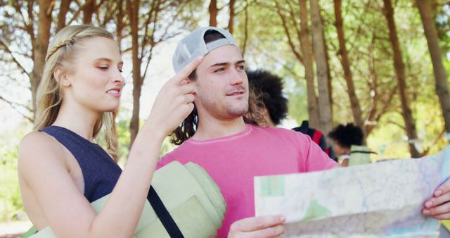 Friends Navigating with Map on Outdoor Adventure - Download Free Stock Images Pikwizard.com