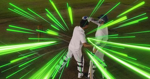 Cricket batsmen celebrating at crease with neon motion streaks highlighting teamwork vibe