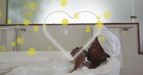 Relaxing in Bath with Digital Heart Overlay and Coffee