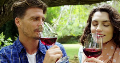 Couple Enjoying Outdoor Wine Tasting in Nature's Tranquility - Download Free Stock Images Pikwizard.com
