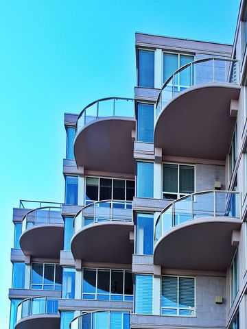 Modern Apartment Building with Glass Balconies