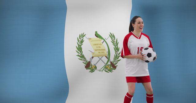 Caucasian female soccer player wearing a red-white jersey holding a soccer ball, positioned in front of Guatemala flag. This composition expresses themes of national pride, sports, and athleticism. Ideal for content related to international sports events, women's empowerment in sports, and cultural appreciation in athletics.