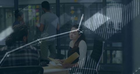 Collaborative office atmosphere with meeting and data analysis