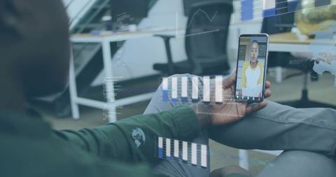 Virtual meeting with holographic data insights in office setting