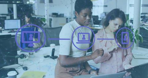 Collaborative Teamwork in Modern Office with Digital Connectivity Concept